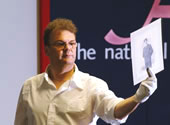 Staff member showing a document