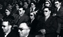 Theatre audience wearing 3D glasses, 1951. Catalogue reference: WORK 25/208