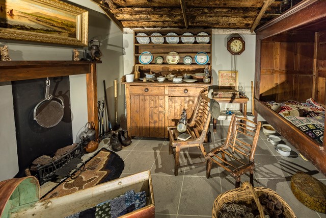 A room with old wooden furniture